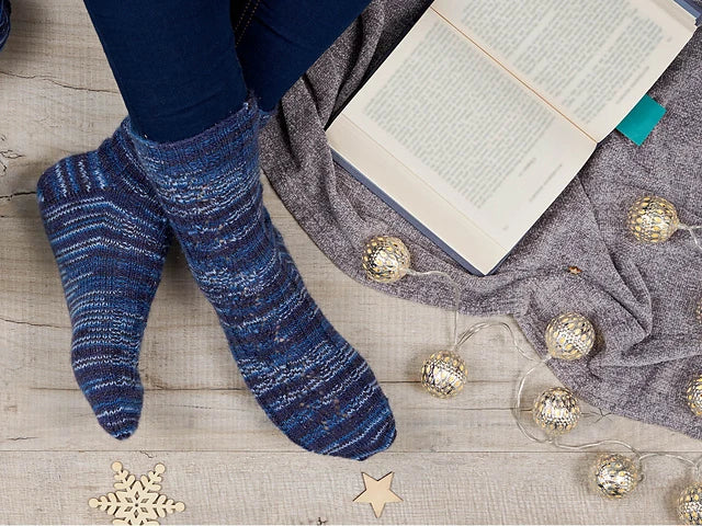 Comet sock pattern in WYS Silent Night yarn