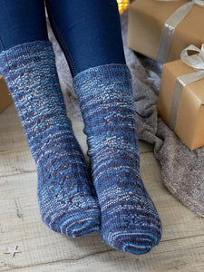 Comet sock pattern in WYS Silent Night yarn